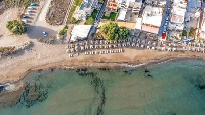 an aerial view of a beach with the ocean at Maria Beach Hotel in Kissamos