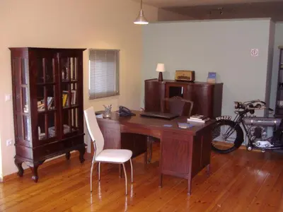 an office with a desk with a computer and a chair at Sorta Apartments in Kato Daratso