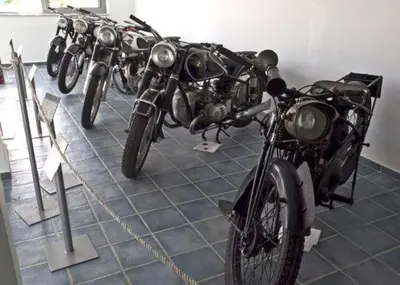 a row of motorcycles parked in a room at Sorta Apartments in Kato Daratso