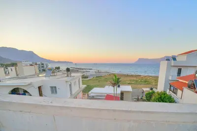 a view of the ocean from a building at Eleni in Kissamos