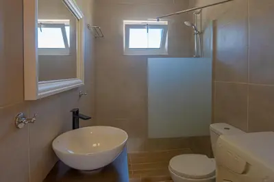 a bathroom with a sink and a toilet at In And Out in Chania Town