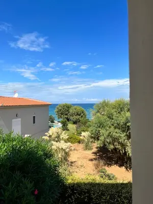 a view of the ocean from a house at Iolkos Hotel Apartments in Kato Daratso