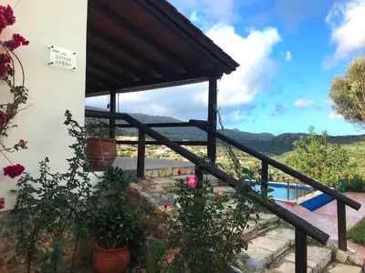 a house with a view of the mountains at Chania Village - Charoupia & Daphne Villas Private Pool - BBQ - Afrata in Afráta