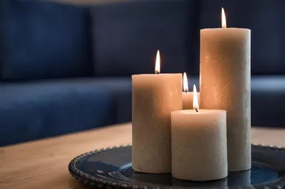 two candles sitting on top of a table at Mirma Luxury Apartment in Chania Town