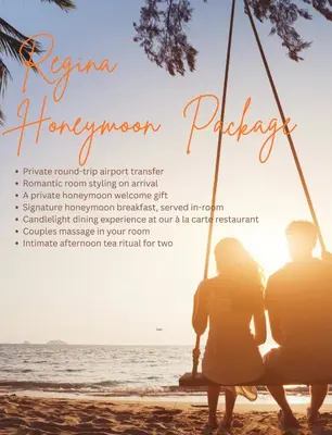 a couple sitting on a swing on the beach at Regina Hotel in Kissamos