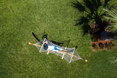 an overhead view of a person laying on a lawn at Elias Luxury Villa in Kalathas