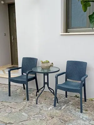 two chairs and a table and a table and two chairs at 