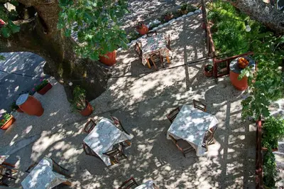 an overhead view of a patio with tables and chairs at Antartisa B&B in Límni