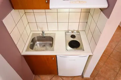 a small bathroom with a sink next to a sink at Irinoula Dreams in Kolymvari