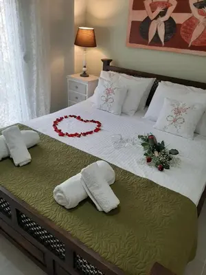 a bedroom with a bed with christmas decorations on it at A Pleasant Stay in Chania in Chania Town