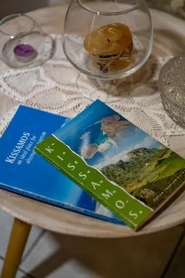 a book sitting on top of a table at Agalide in Kissamos