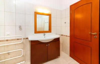 a bathroom with a sink and a mirror at Charming and Comfy House in Agia Marina Nea Kydonias