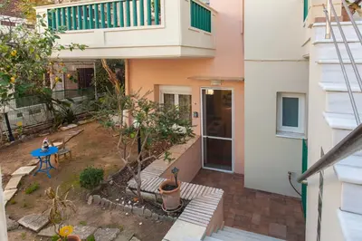 an aerial view of a house with a garden at Evelia Apartment in Galatás