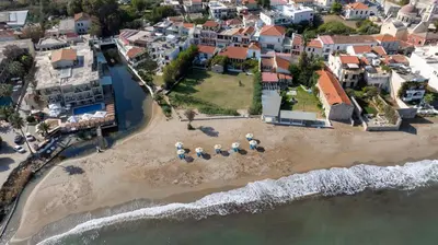an aerial view of a beach with a group of houses at Ismini Apartments in Kalyves