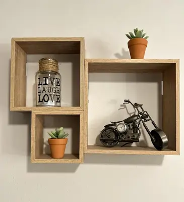a wooden shelf with a motorcycle on it at Antigoni's Studio Cozy Private Apartment in Kissamos