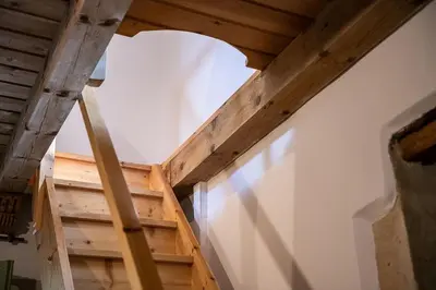 an opening in the ceiling of a room with wooden beams at Lemon Tree Eco-Retreat in Gavalochori