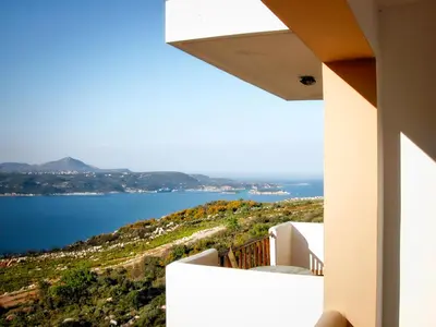 a view of the water from a house at Areti Aparthotel in Áptera