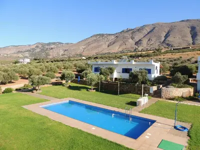 an image of a villa with a swimming pool at Studios Fokies in Khóra Sfakíon