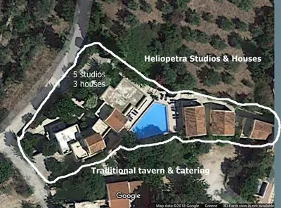 a site plan of a house with buildings at Crete holiday rental small village close to beaches -sharing a large pool in Vamos