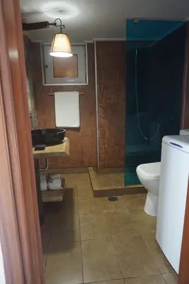 a bathroom with a toilet and a sink at Seas the view in Chania Town