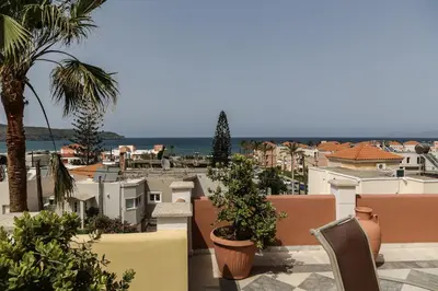 a view of the city from the roof of a building at Heaven Apartments in Agia Marina Nea Kydonias