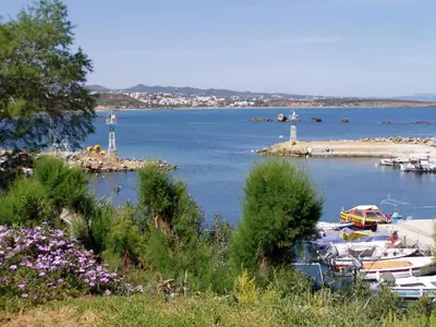 a group of boats are docked in a harbor at Marika's Guest House Chania in Chania Town