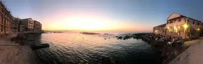 a group of people standing in a body of water at Microcosmos Halepas in Chania Town