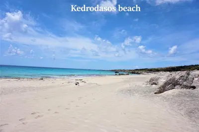 a sandy beach with the ocean in the background at Sea Lake Holiday House in Elafonisi