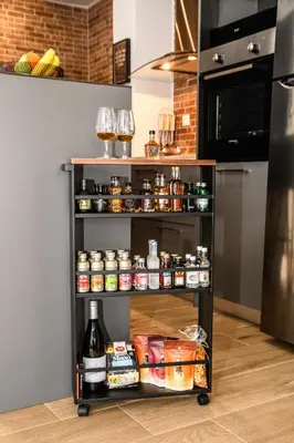 a shelf in a kitchen filled with food at MOS Luxury City Suites - The R suite in Chania Town