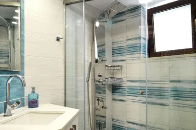 a bathroom with a shower and a sink at Anna 's House - Garden Cottage in Kissamos in Kissamos