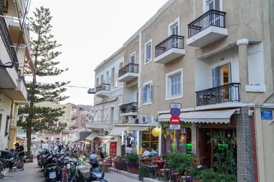 a group of motorcycles parked on a street next to a building at Casa Armada in Chania Town