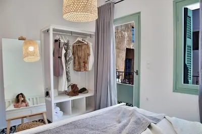 a girls bedroom with a dresser and a mirror at Old town, Splantzia modern house in Chania Town