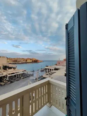 a view of the ocean from a balcony at Old Port - Bellavista Studio in Chania Town