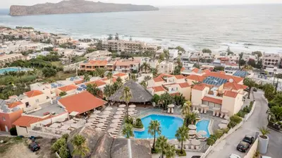 an aerial view of the resort and the ocean at Eurohotel Theo Hotel in Agia Marina Nea Kydonias