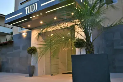 a lobby of a hotel with a potted plant at Eurohotel Theo Hotel in Agia Marina Nea Kydonias