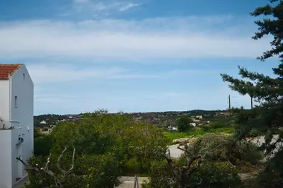 a view from the balcony of a house at Tersanas Village Apartments in Tersanas