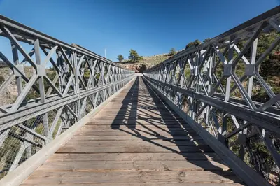 a bridge in the desert with a blue sky at ARADENA TRADITIONAL House 1 in Arádhaina
