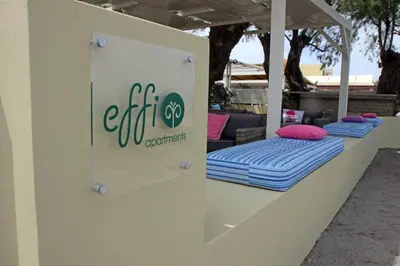 a sign for an event with two mattresses at Effi Apartments in Plataniás