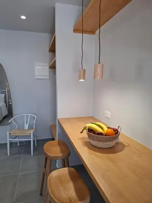 a bowl of fruit on a counter in a kitchen at Grammeno Seaside Studios in Palaiochóra