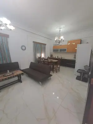 a living room with a couch and a table at Chania Dream Home in Chania Town