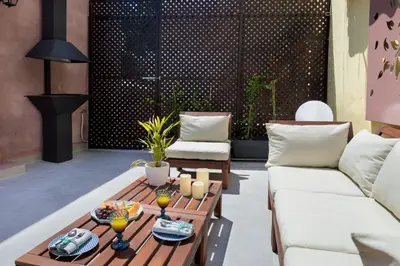 a living room with a couch and a table at Iosifinas Boutique House in Chania Town