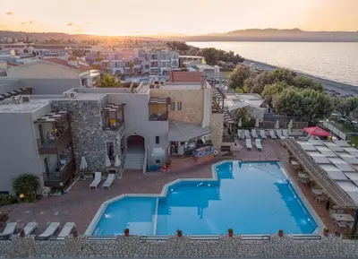 an aerial view of a resort with a swimming pool at Erato Beach Hotel Adults Only by Smile Hotels in Plataniás