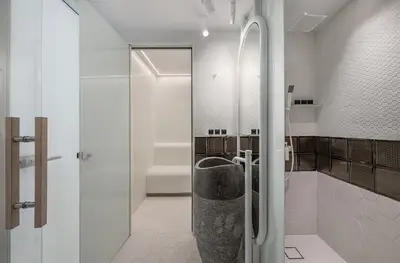 a bathroom with a walk in shower and a toilet at Lagon Life Spirit Boutique Hotel - Adults Only in Chania Town