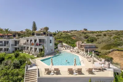 an image of a swimming pool at a resort at Hermes Sea View in Stalos