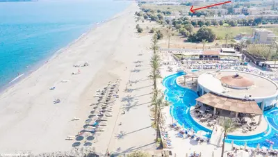 an aerial view of a beach and a resort at Ocean Breeze Apartments in Gerani Chanion