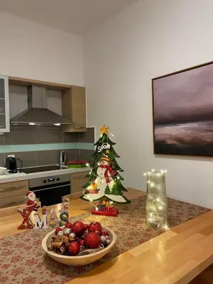 a kitchen with a christmas tree on a table at Luxury Villa Mystique with Amazing Seaview in Chania Town