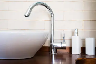 a kitchen sink with a faucet on a counter at Grandma's Chic Home in Chania Venetian Harbor in Chania Town