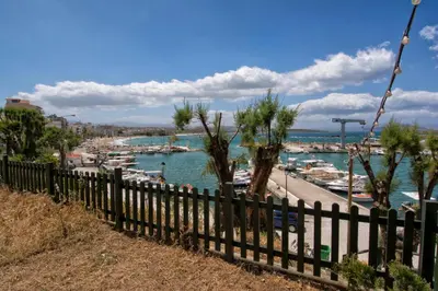 a view of a harbor with boats in the water at Semeli Studios in Chania Town