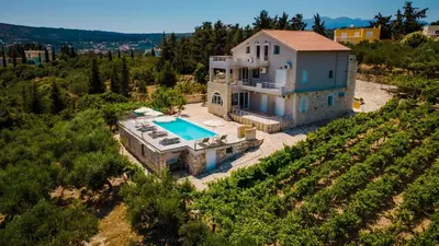 an aerial view of a house with a swimming pool at Villa Konstantinos Hilltop Vineyard Escape in Chania Town