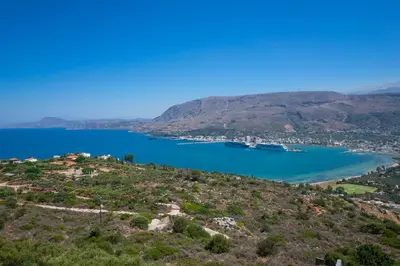 a view of a bay with boats in the water at Kassiopeia Villa in Chania Town